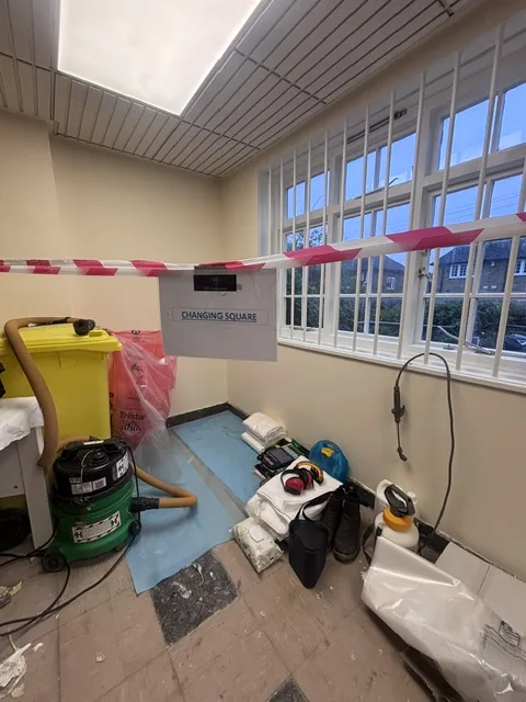 Asbestos floor tile and bitumen removal in Friern Barnet